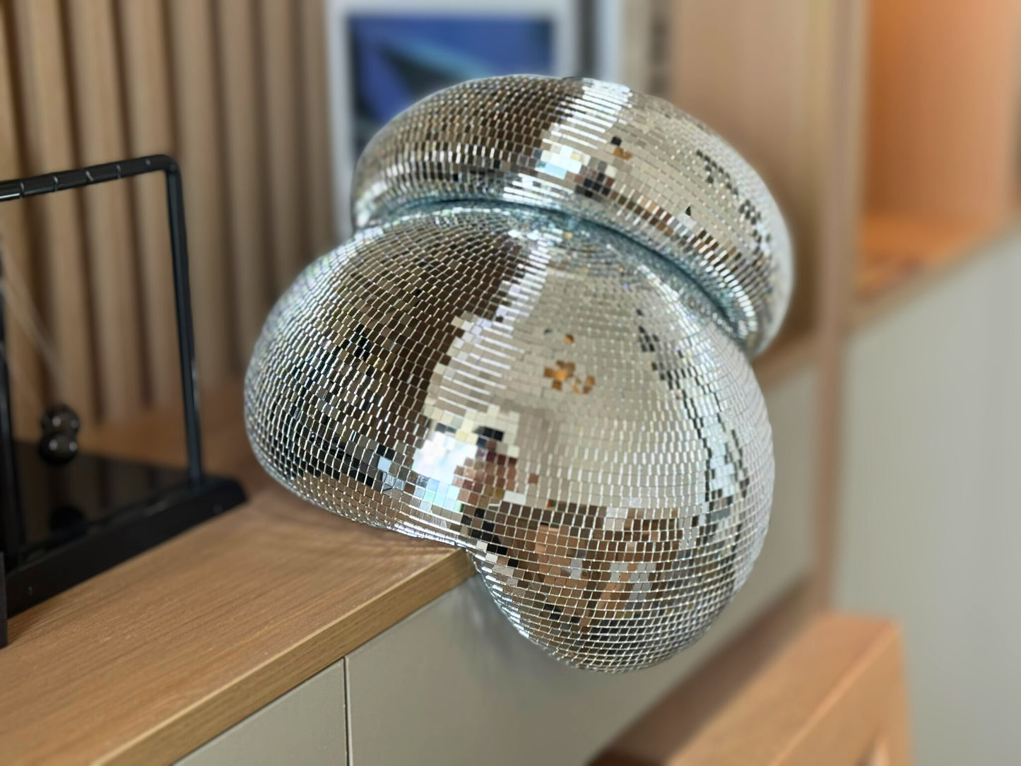 Melted Disco Ball Duo: A Magical Symphony of Light and Shadow